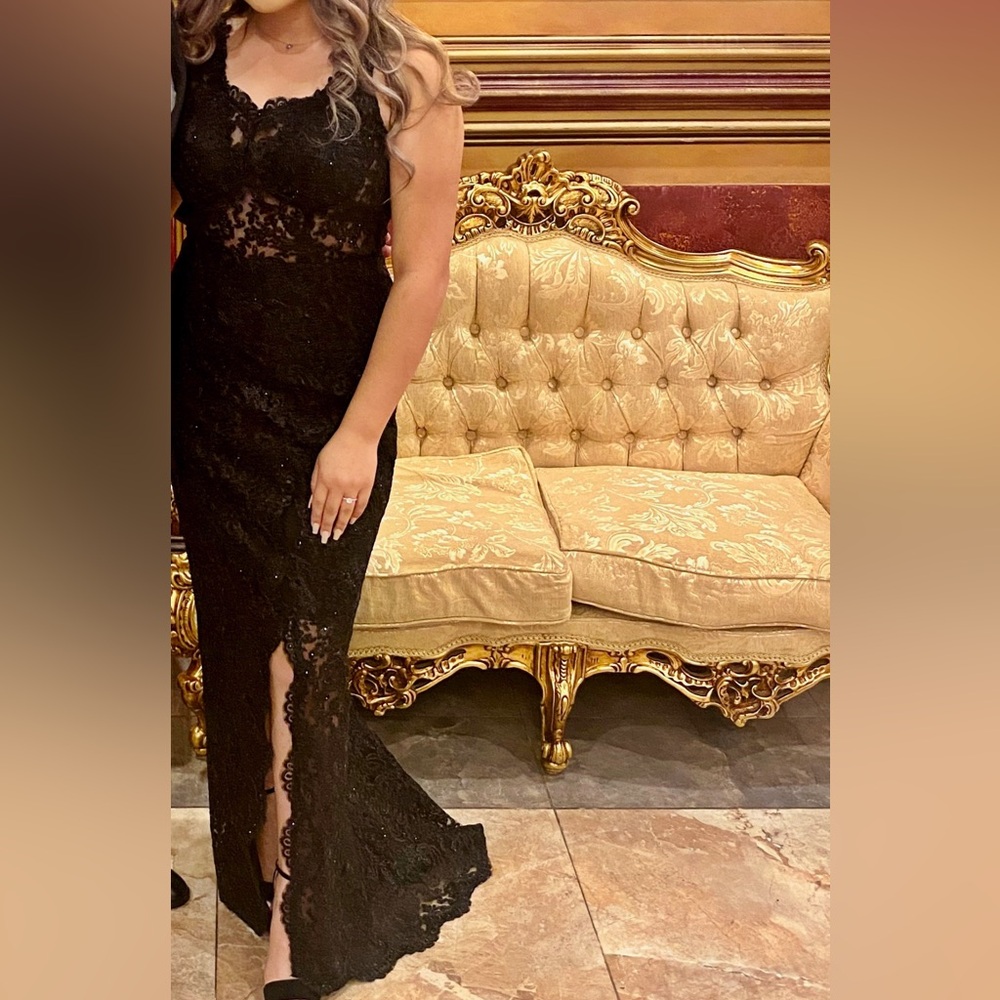 Black long dress with an open back and a slit very beautiful